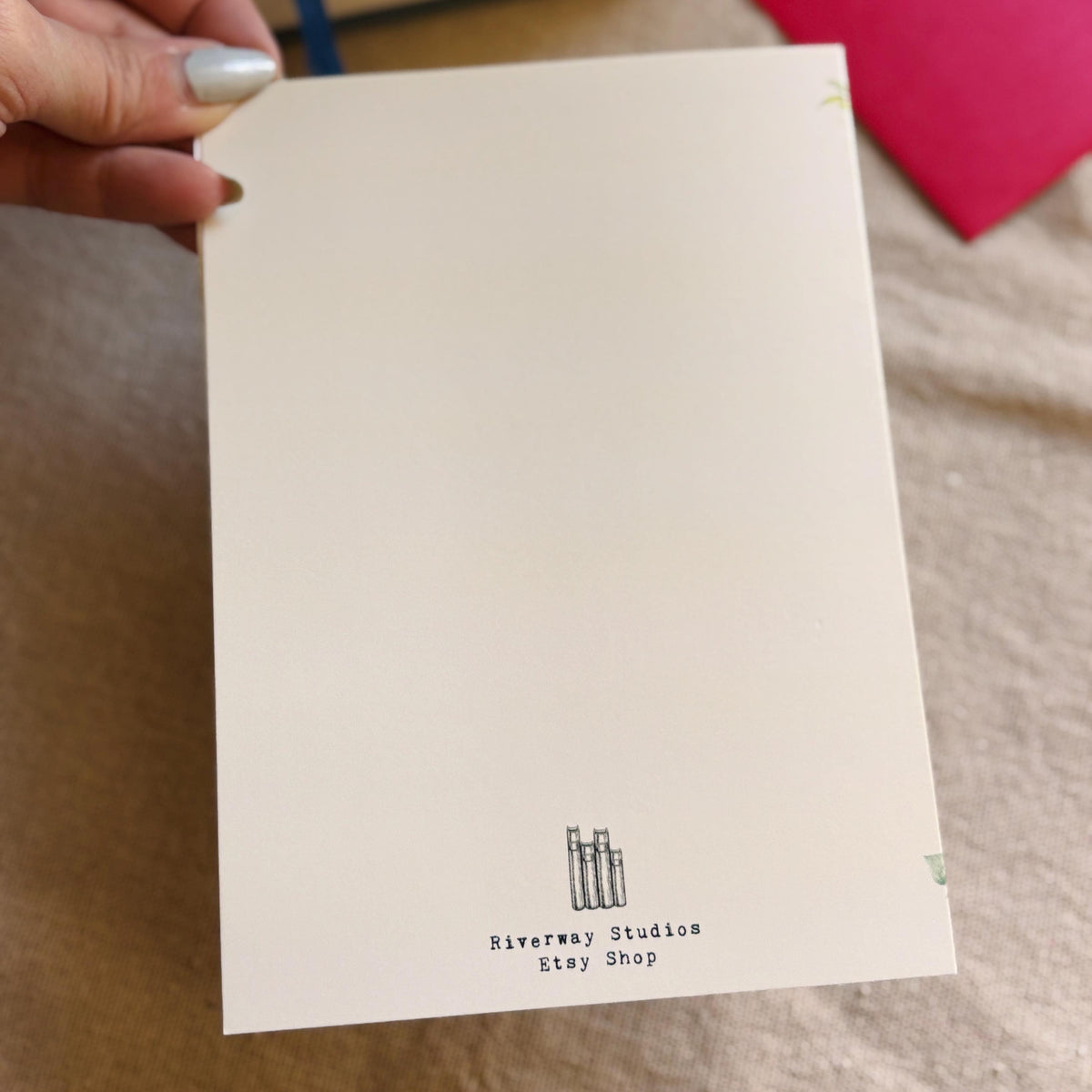 Back of greeting card with shop logo