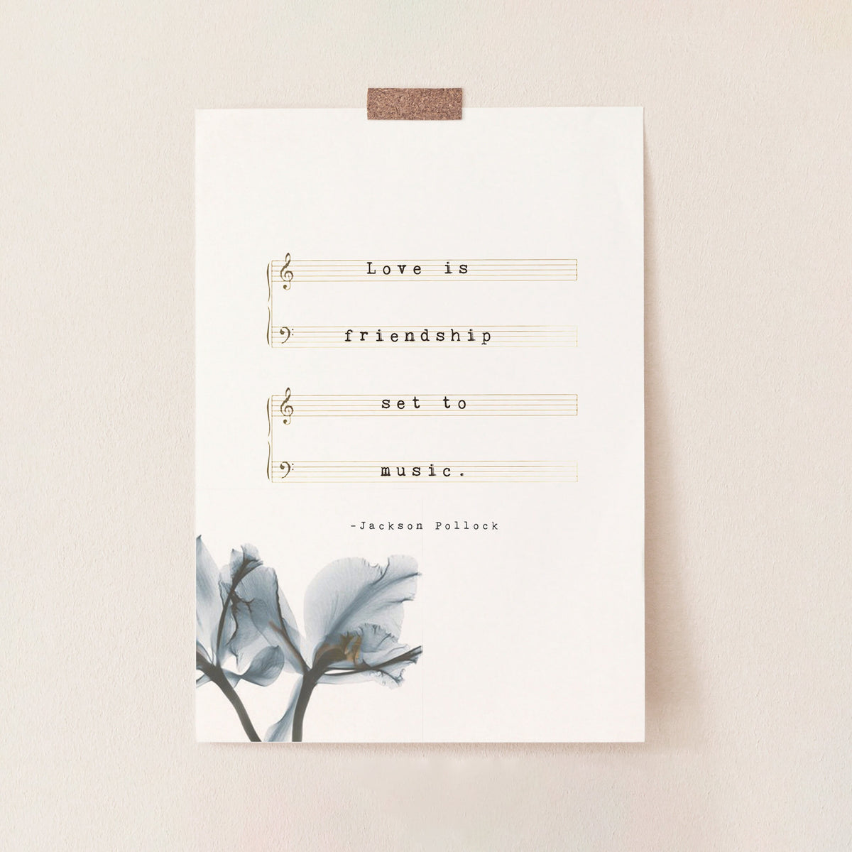 A typographic art print featuring the quote 'Love is friendship set to music.' on musical staff lines, with a small blue-gray floral illustration in the lower left and the text '-Jackson Pollock' near the bottom.