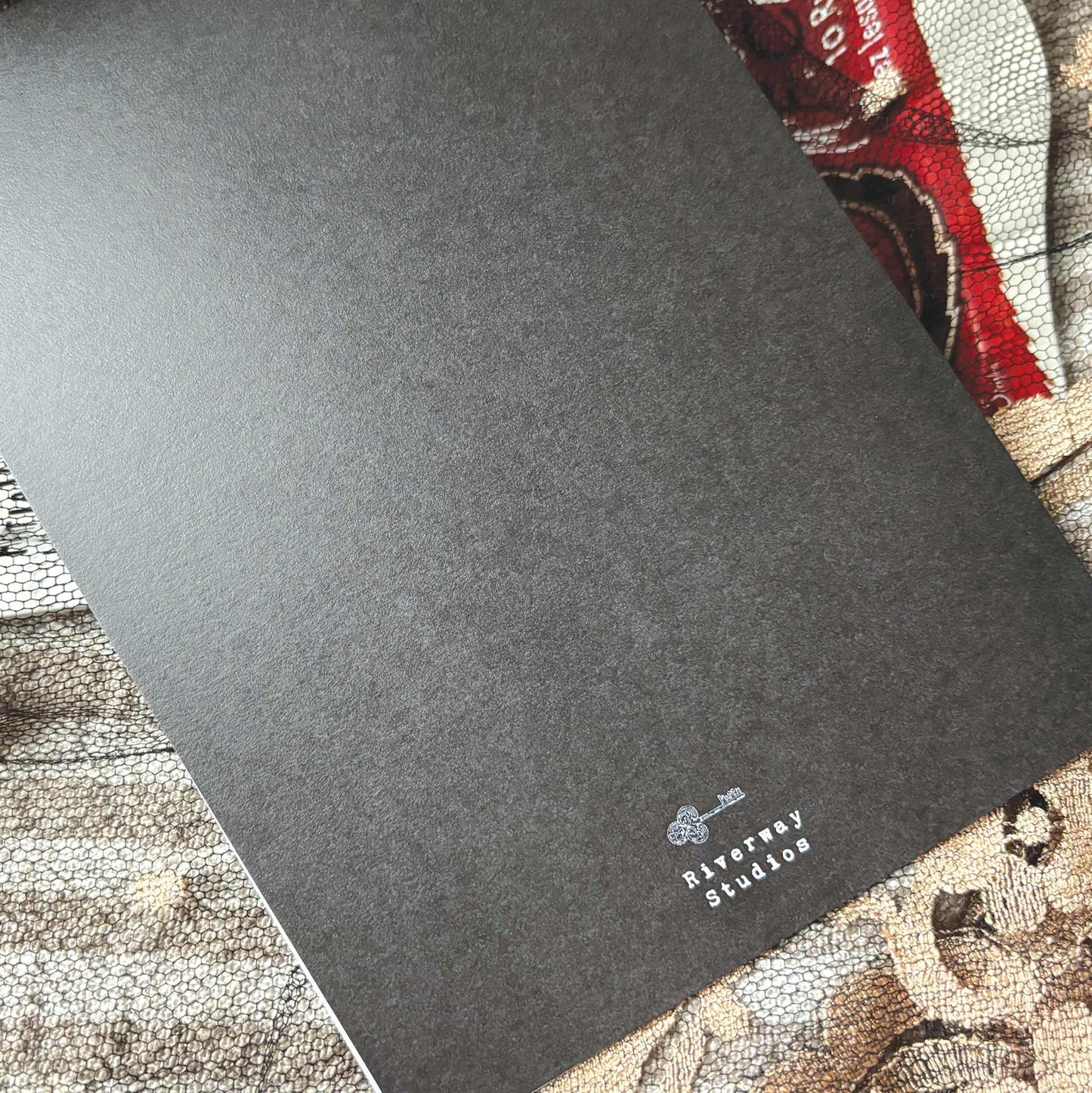 Back of greeting card with a lock logo