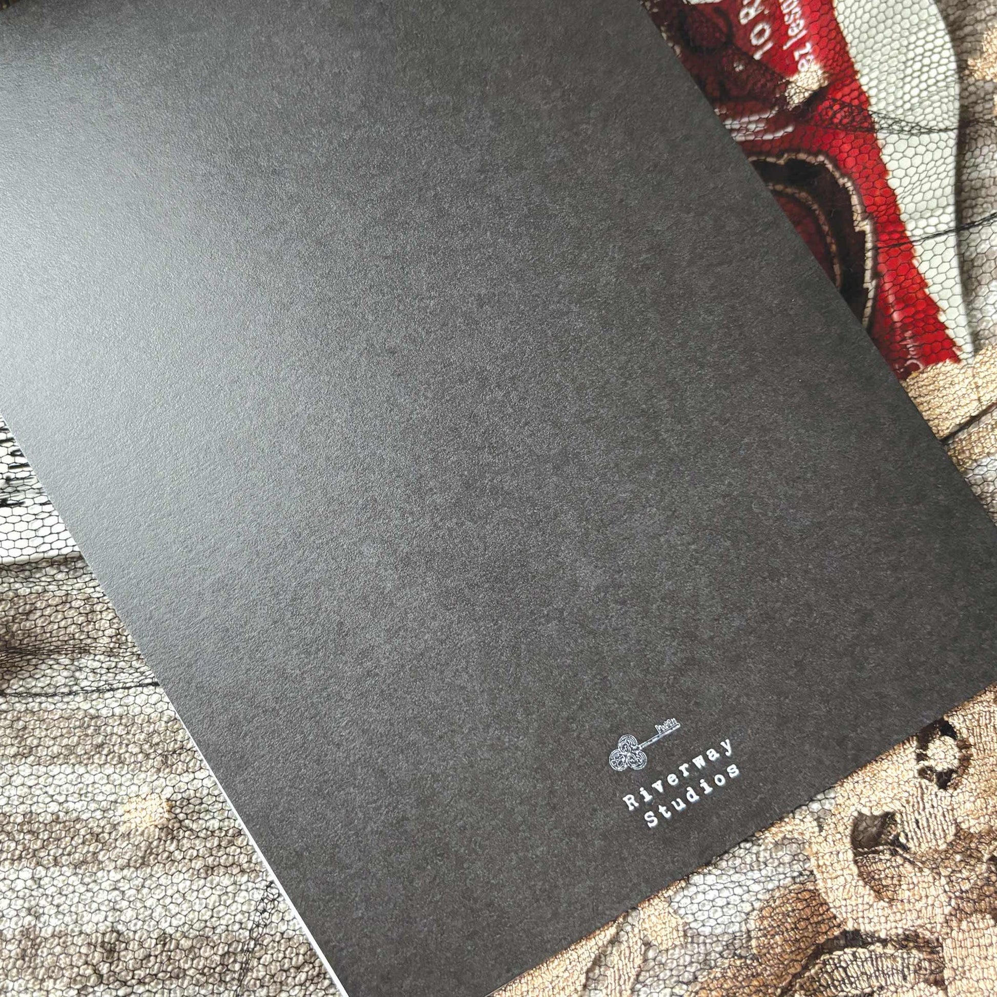 Back of greeting card with a lock logo