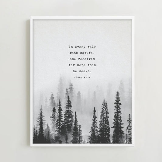 An Art print of misty black and white pine trees and the quote by John Muir which says "In every walk with nature, one receives far more than he seeks"