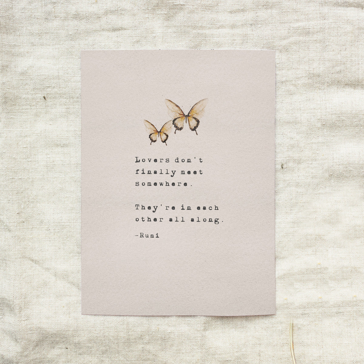 A typographic art print featuring the quote 'Love is friendship set to music.' on musical staff lines, with a small blue-gray floral illustration in the lower left and the text '-Jackson Pollock' near the bottom.