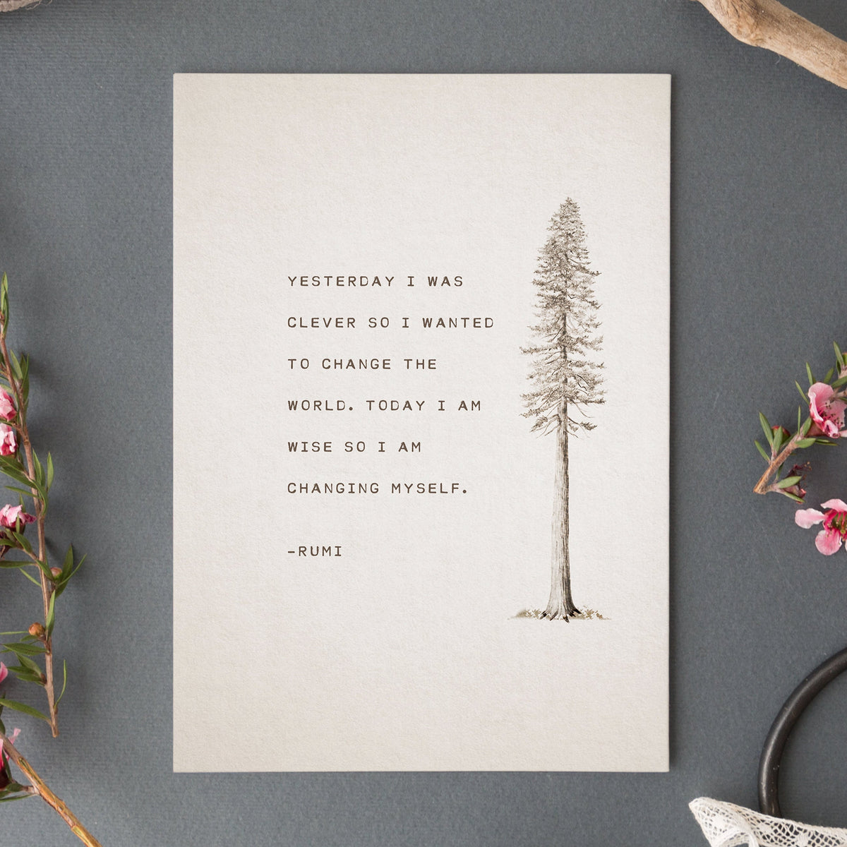 An art print feature an illustration of a pine tree and a quote that says "Yesterday I was clever so I wanted to change the world. Today I am wise so I am changing myself"-Rumi