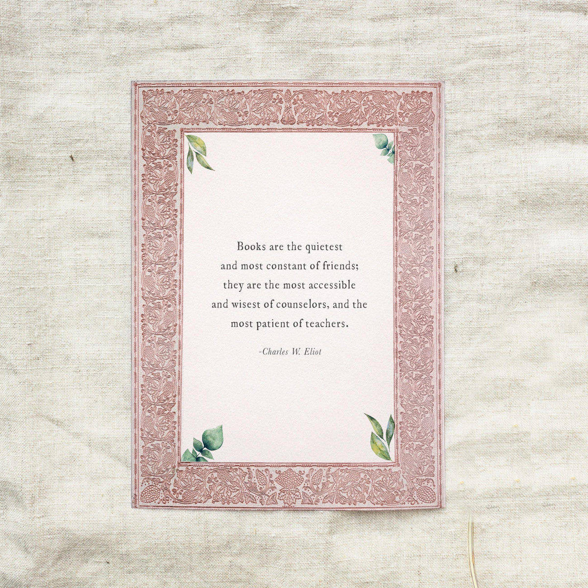 A wall art print of Charles Eliot Book Quote  "Books are the quietest and most constant of friends" with an ornate red border