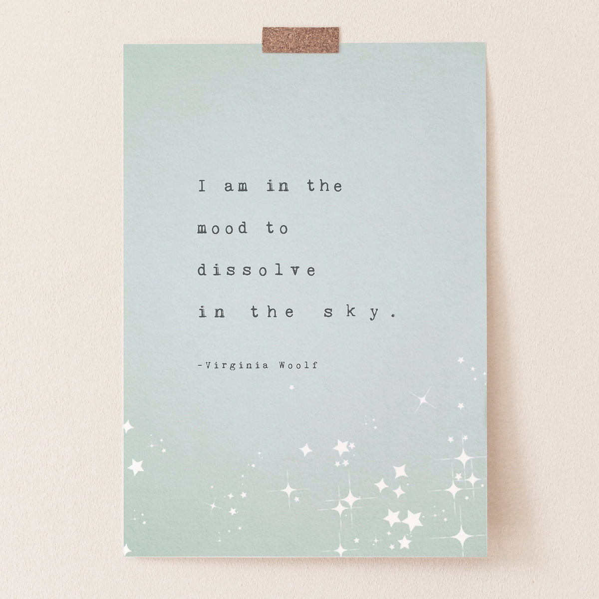 A vertical art print featuring a quote by Virginia Woolf, with the quote "I am in the mood to dissolve in the sky"The print has a pale mint green background with black typewriter-style text and white star illustrations at the bottom.