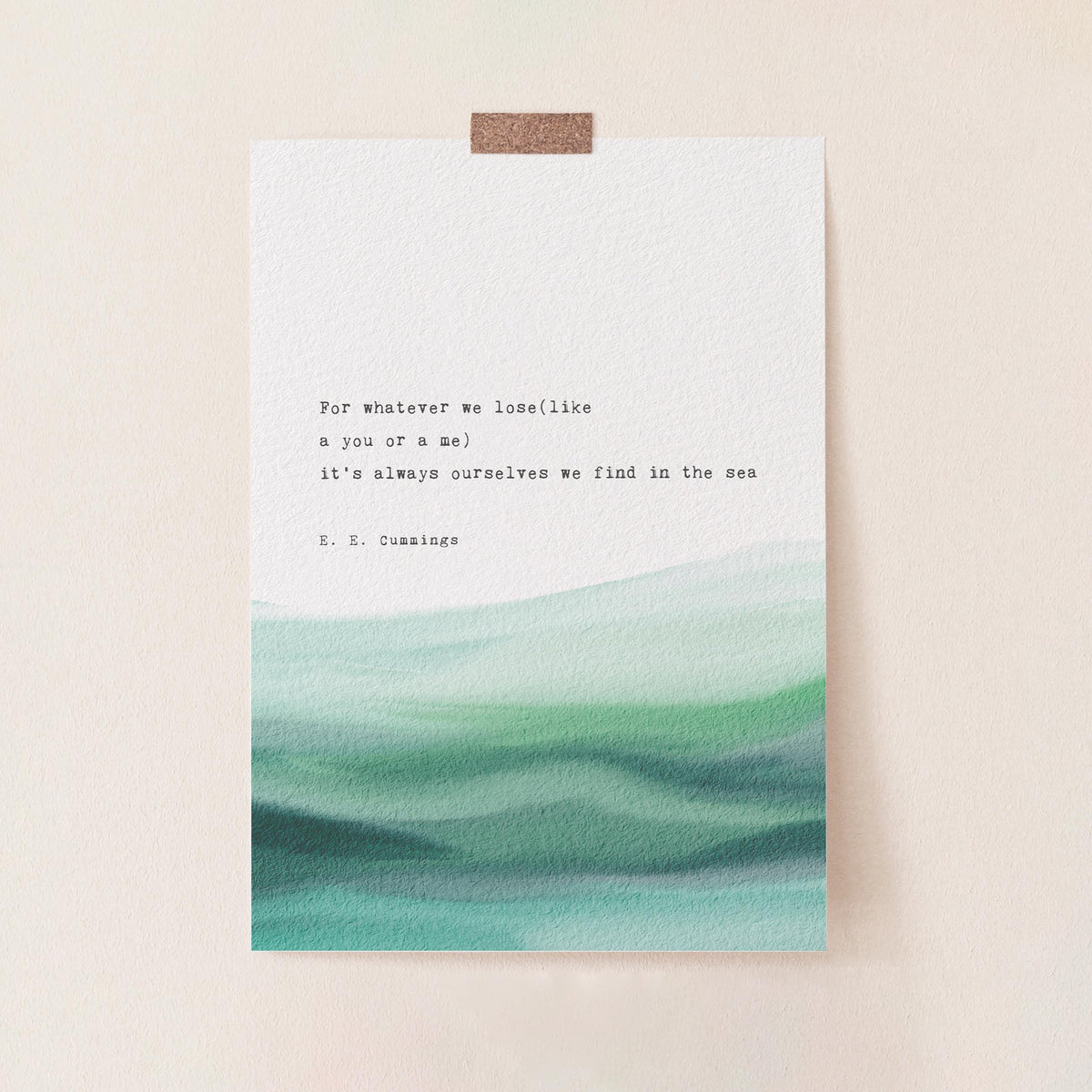 An art print featuring a quote by e.e. cummings on a soft watercolor background which says "for whatever we lose(like a you or a me) it's always ourselves we find in the sea"