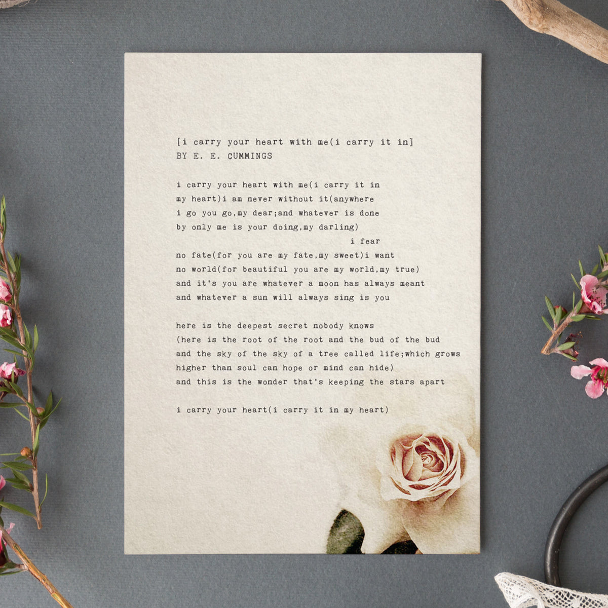 Art print of the e.e. cummings poem "I carry your hear with me" set on a biege background with a rose in the right corner