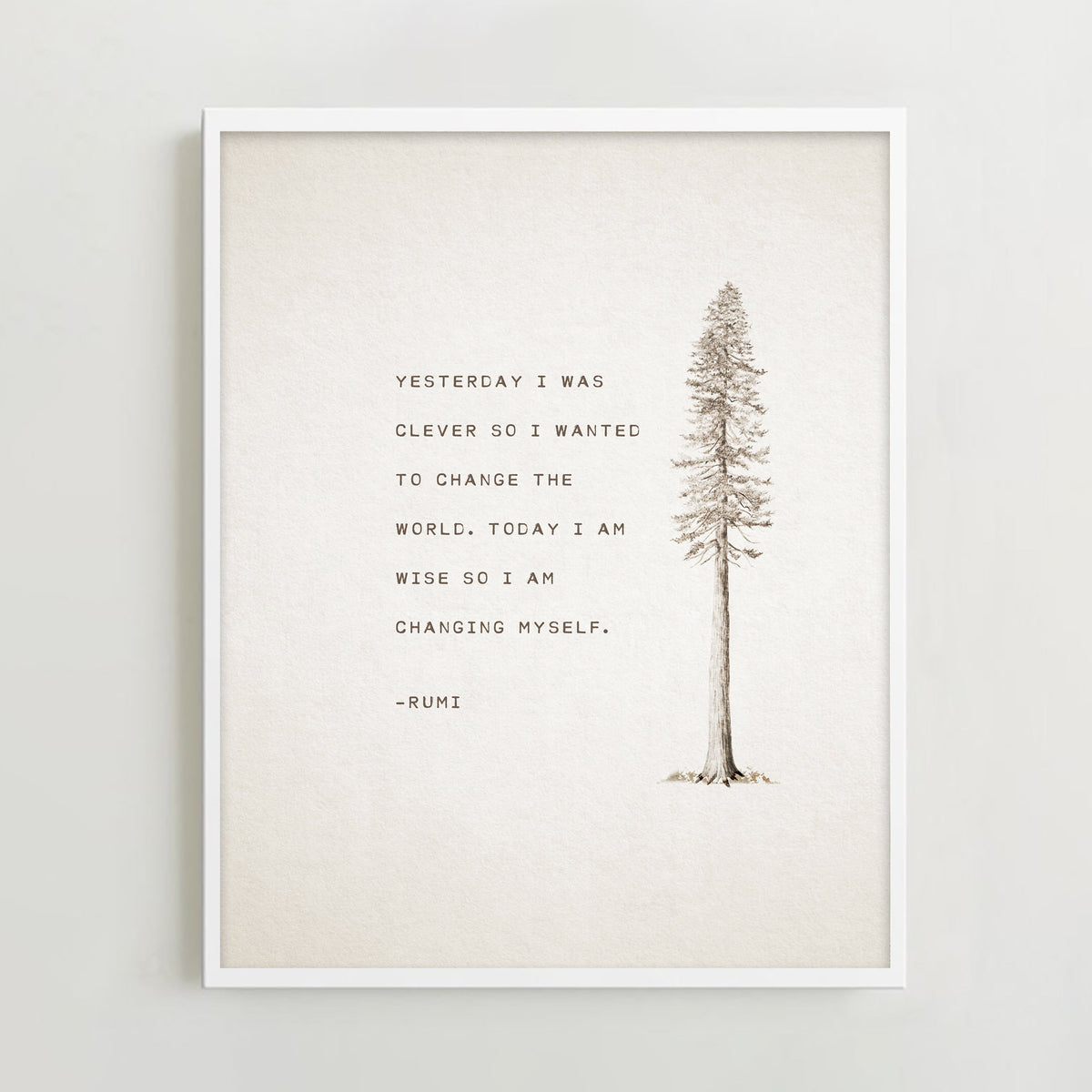 An art print feature an illustration of a pine tree and a quote that says "Yesterday I was clever so I wanted to change the world. Today I am wise so I am changing myself"-Rumi